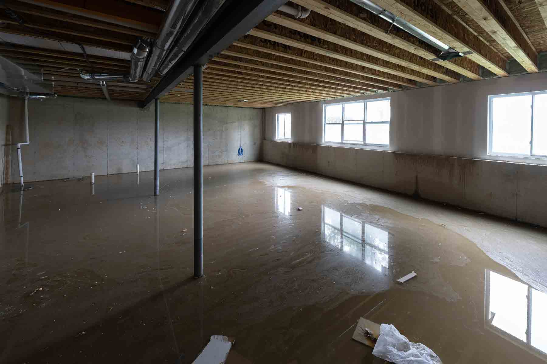 A home basement floor that flooded due to a leak