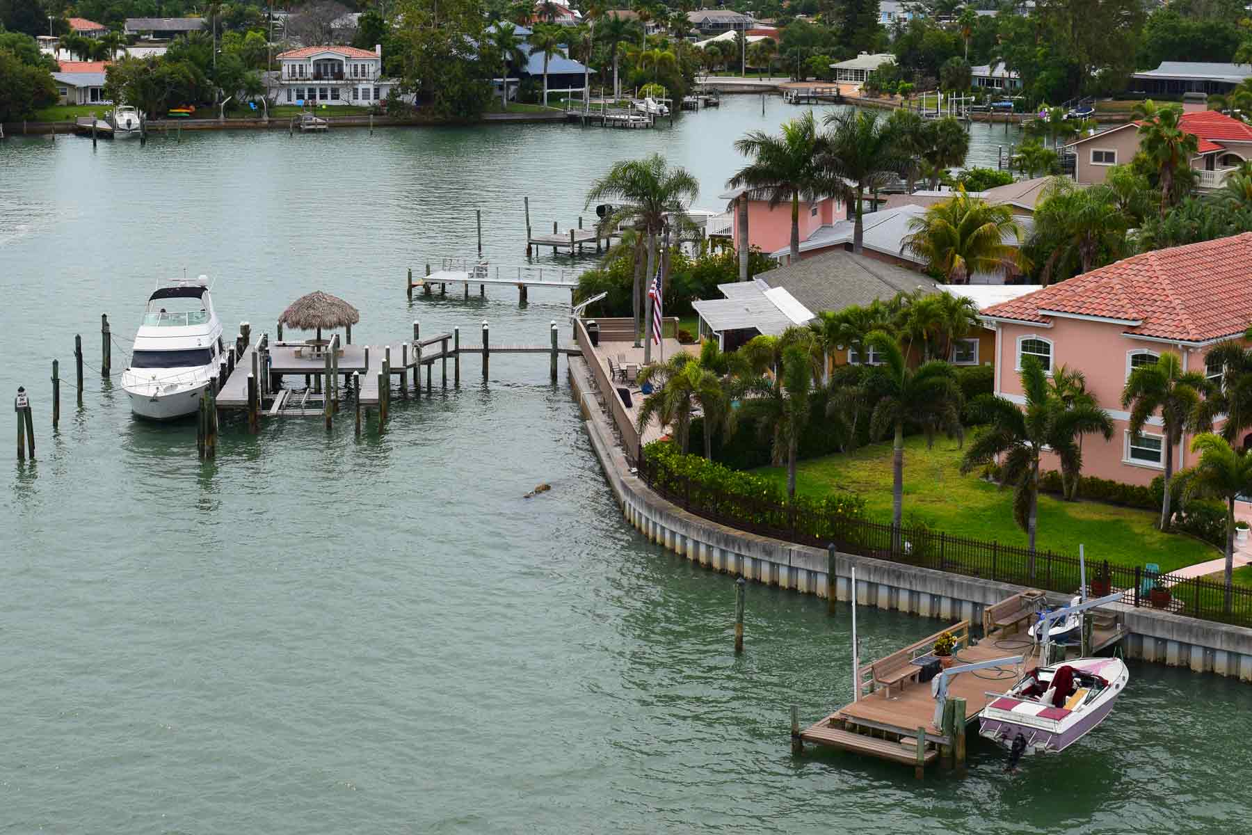 Boat docks next to homes along a Florida intercoastal waterway.