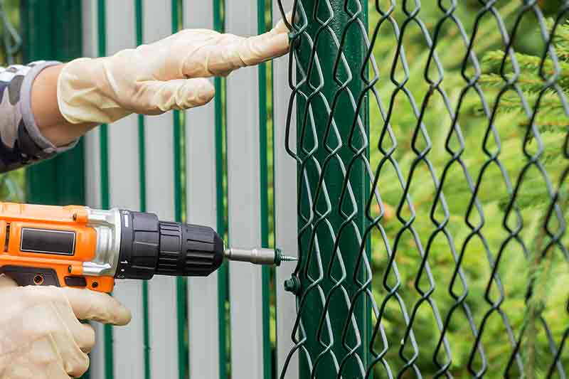 Chain link fence repair cost