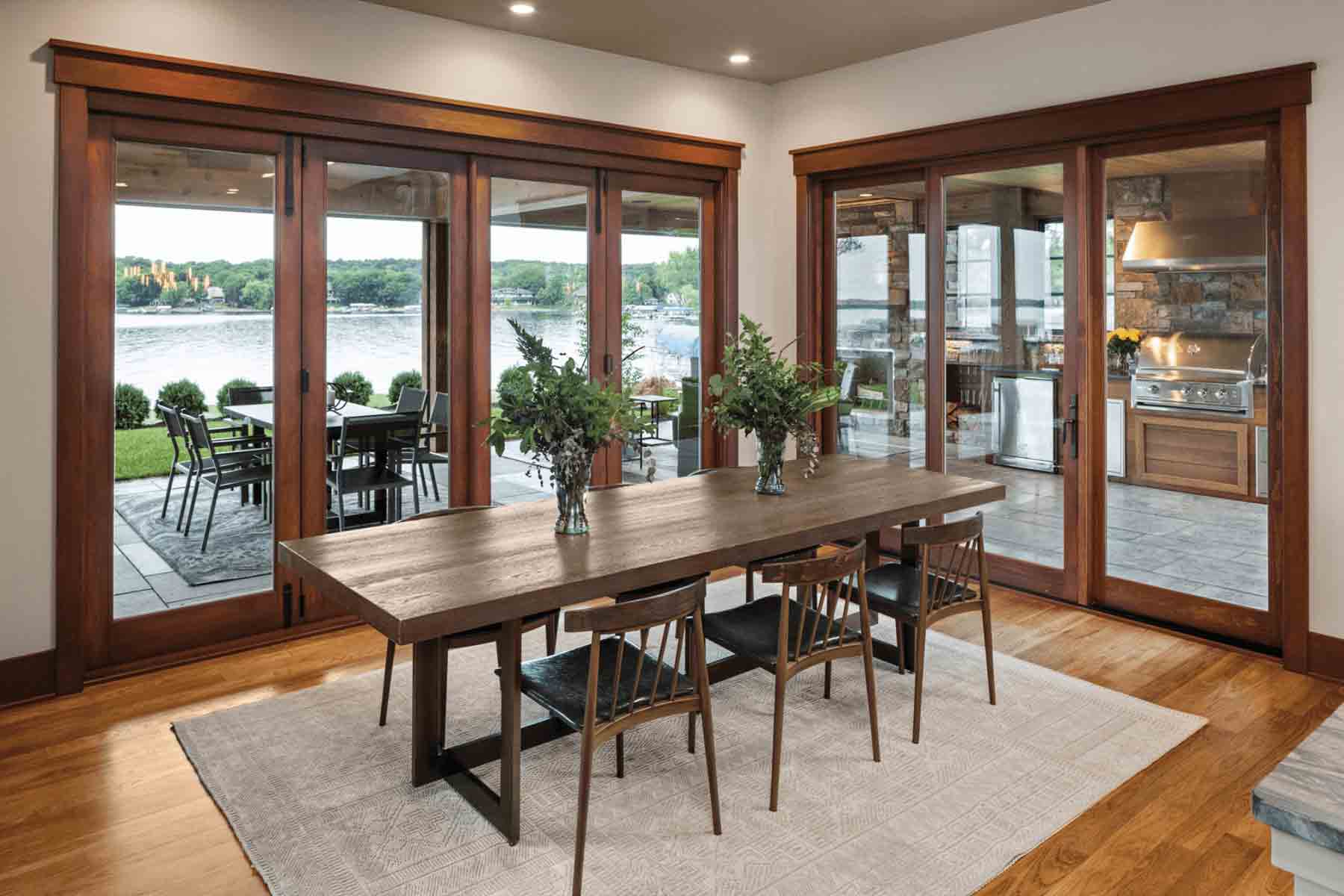 Marvin patio doors leading from a home's dining room to a patio with an outdoor kitchen (Photo credit: Marvin Windows and Doors) Marvin patio doors leading from a home's dining room to a patio with an outdoor kitchen (Photo credit: Marvin Windows and Doors)